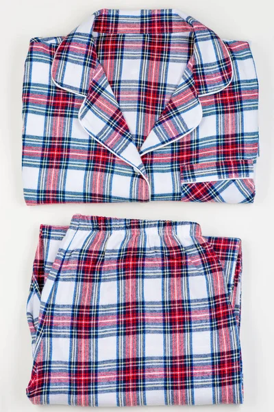 Pijamale clasice calde verificate pe fundal alb closeup — Fotografie, imagine de stoc