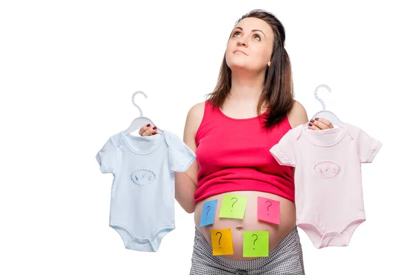 Conceptual photo-pensive woman trying to guess the sex of the fu — Stock Photo, Image