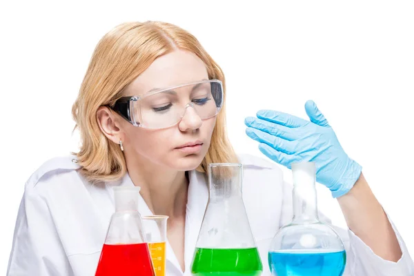 Portrait of an experienced chemist with multi-colored substances — Stock Photo, Image