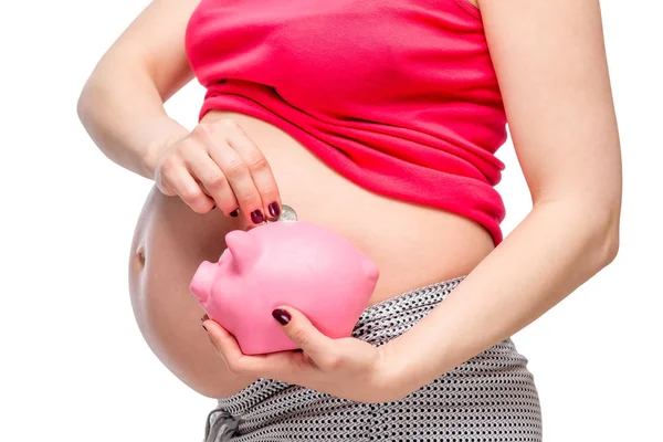 Kumbara bir arka plan hamile bir kadın elinde