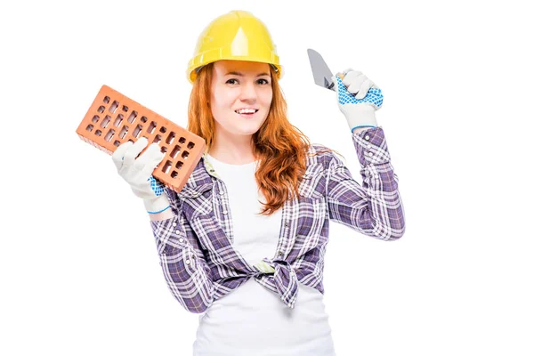 Szczęśliwy, że kobieta jest robotnik budowlany, portret na tle biały — Zdjęcie stockowe