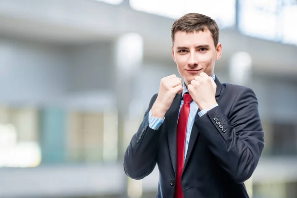 Conceptual photograph of a successful businessman ready for batt — Stock Photo, Image