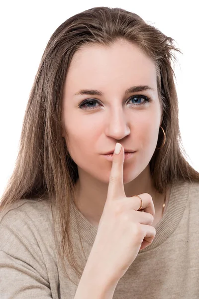 Žena tvář s prstem poblíž rty - quie gesto konceptuální fotografie — Stock fotografie