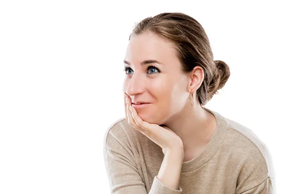 Portrait of a young beautiful girl on a white background in stud — Stock Photo, Image