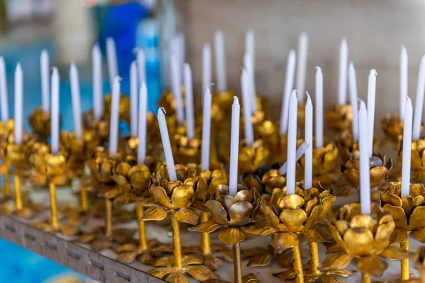 Candle stand in a temple in Thailand close-up — Stock Photo, Image