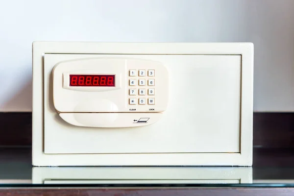 Safe with coded lock on the table in the hotel close-up — Stock Photo, Image