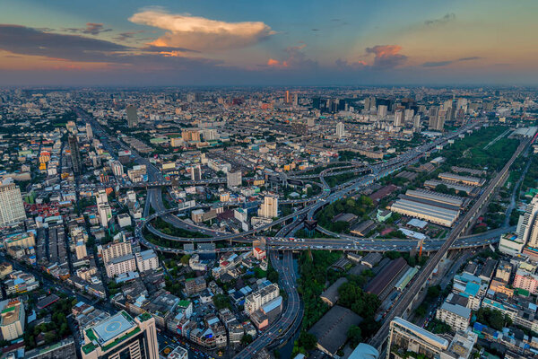 View of the traffic of the city of Bangkok at sunset, roads and bridges