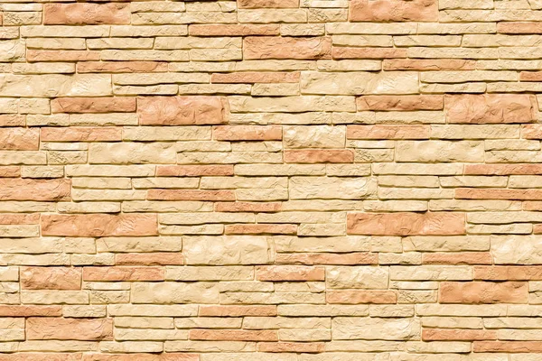 Background - beige stone facade decoration close-up — Stock Photo, Image