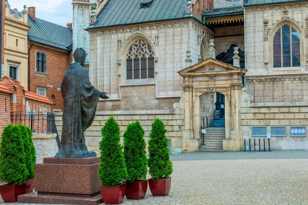 Beautiful catholic church and sculpture of Pope — Stock Photo, Image