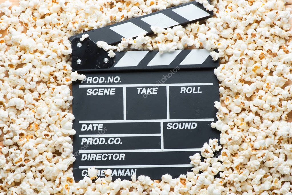 video clapper for shooting a movie on a background of popcorn cl