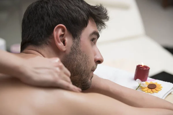 Sports massage. Massage therapist massaging shoulders of a male — Stock Photo, Image