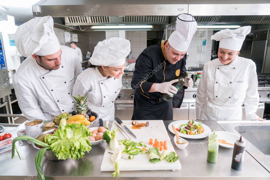 Chef Cooking, Cutting and preparing next plate