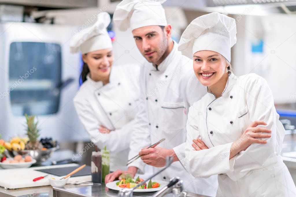 Chef Cooking, Cutting and preparing next plate