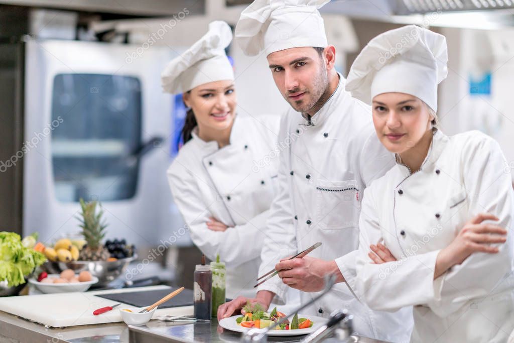 Chef Cooking, Cutting and preparing next plate