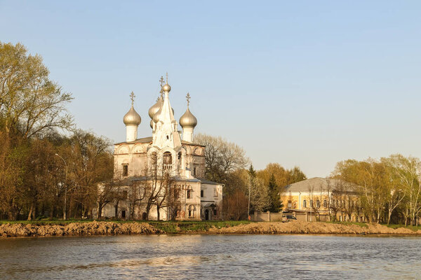 Vologda. Beautiful spring day on the river Bank. The Church in t