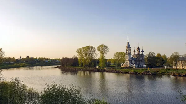 Vologda. Beautiful spring day on the river Bank. Church Of The M