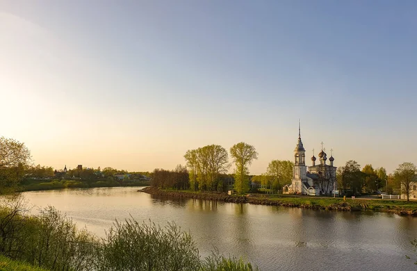 Vologda. Beautiful spring day on the river Bank. Church Of The M
