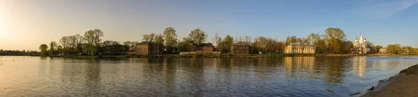 Vologda. Beautiful spring day on the river Bank. Panorama. Churc