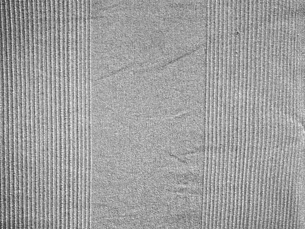 Strach grunge vektorová textura pleteniny, svetr, svetr, svetr, dres. Černobílé pozadí. — Stockový vektor