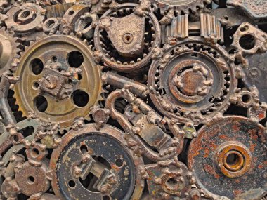 Paslı metalden yapılmış eski, yıpranmış, kaba mekanik dişliler. Tasarım minimalizmi. Demir bileşimi. Retro tarzı. Şık üst ve moda tasarım dokuları, dişliler yuvarlak.