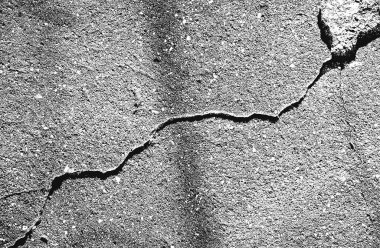 Çatlamış beton vektör dokusu sıkıntısı. EPS8 illüstrasyonu. Siyah ve beyaz grunge arka planı. Taş, asfalt, alçı, mermer.