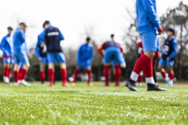 Young Unrecognizable Soccer Team Doing Warm Exercises Out Play Unfocused — Stock Photo, Image