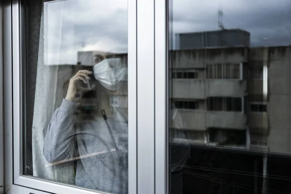 Woman Respirator Talking Her Smart Phone Looking Window Her House — Stock Photo, Image