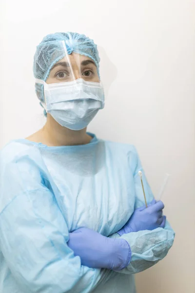 young nurse with respirator with protective clothing, portrait