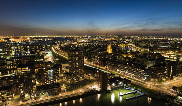 Rotterdam, The Netherlands - March 24, 2017: Panorama taken from the Euromast in the Netherlands with offices, buildings, houses, traffic and sunset.