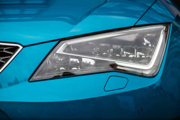 Close-up of headlights of a car