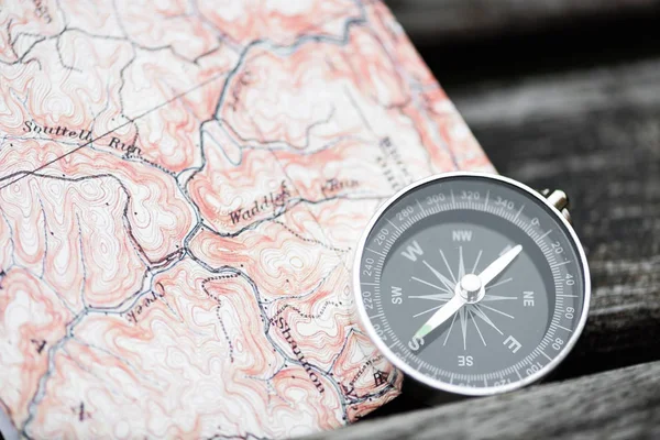 Compass and map. Travel concept