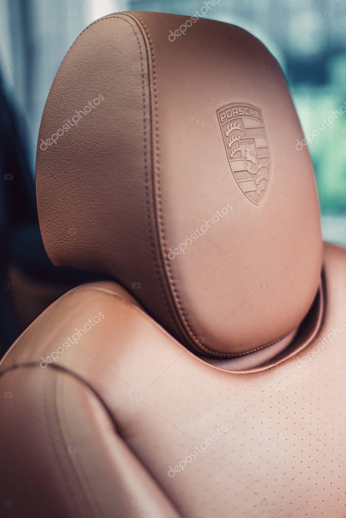 Kyiv, Ukraine - August 7th, 2016: Porsche chair with Porsche logo on the headrest