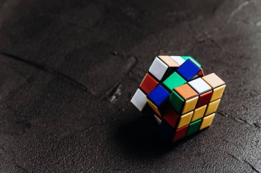 Rubik's cube on black background clipart
