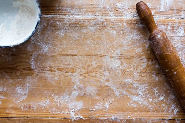 Ingredients for cooking baking - flour, dough on wooden background — Stock Photo, Image