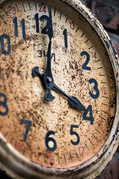 Close-up of Old Clock located on brick wall — Stock Photo, Image