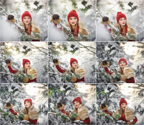 Vacker kvinna i rött med brun päls cape njuta av vintern naturen i skogen. Blond flicka poserar under snötyngda träd grenar. Ung kvinna med snöflingor runt i ljusa kall dag, makeup — Stockfoto