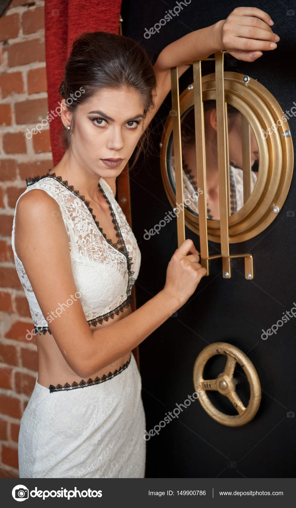 Fashionable Sensual Attractive Lady With White Dress Standing Near