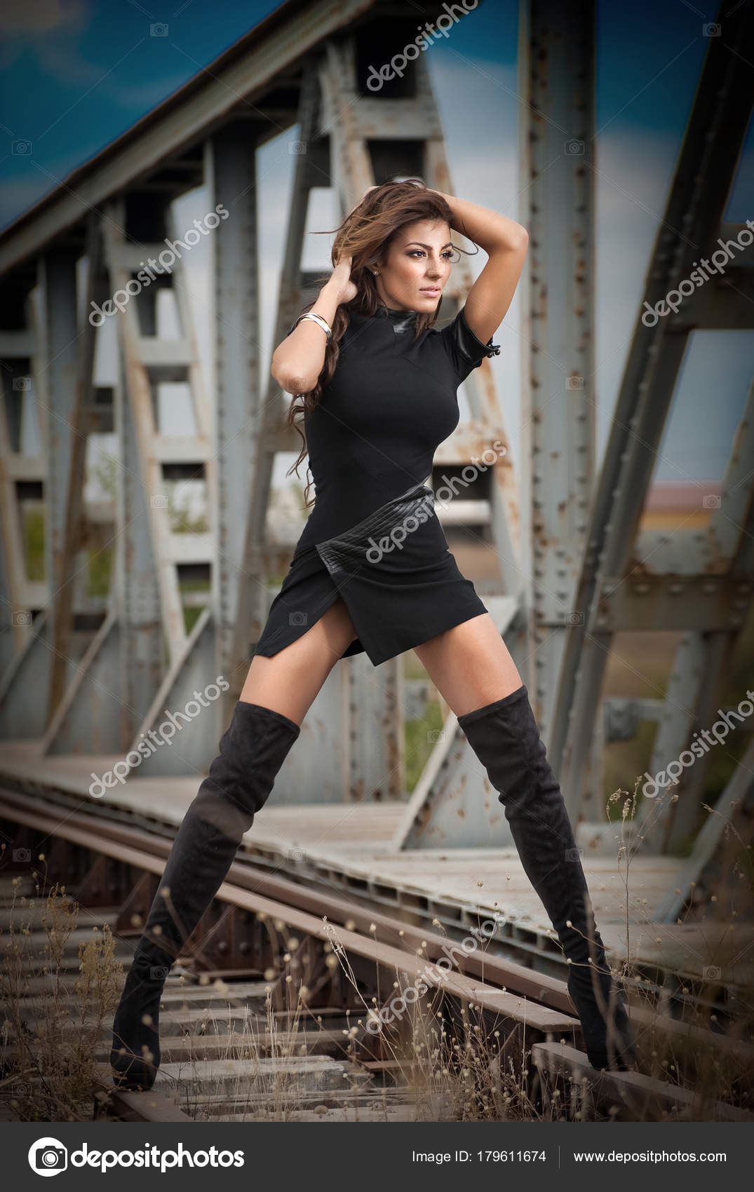 black dress with long boots