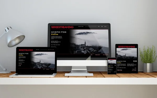 Workplace with video streaming online responsive website — Stok fotoğraf