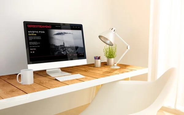 Minimalist workplace with video streaming computer — 图库照片