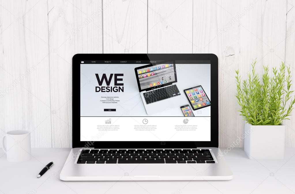 Laptop with web design screen