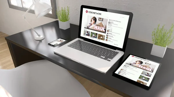 Devices on table in modern office — Stock Photo, Image