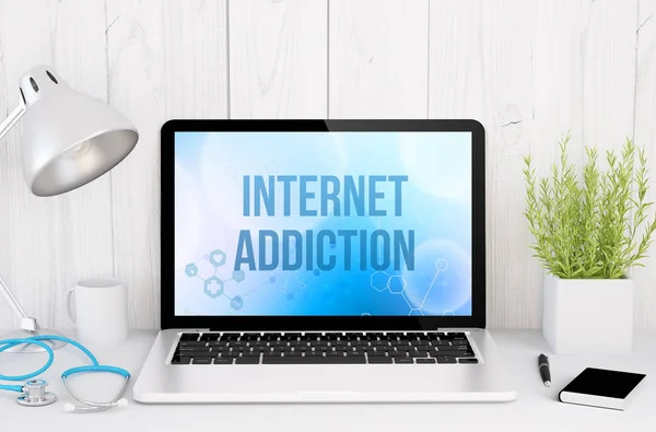 Escritorio con adicción a Internet en la pantalla — Foto de Stock
