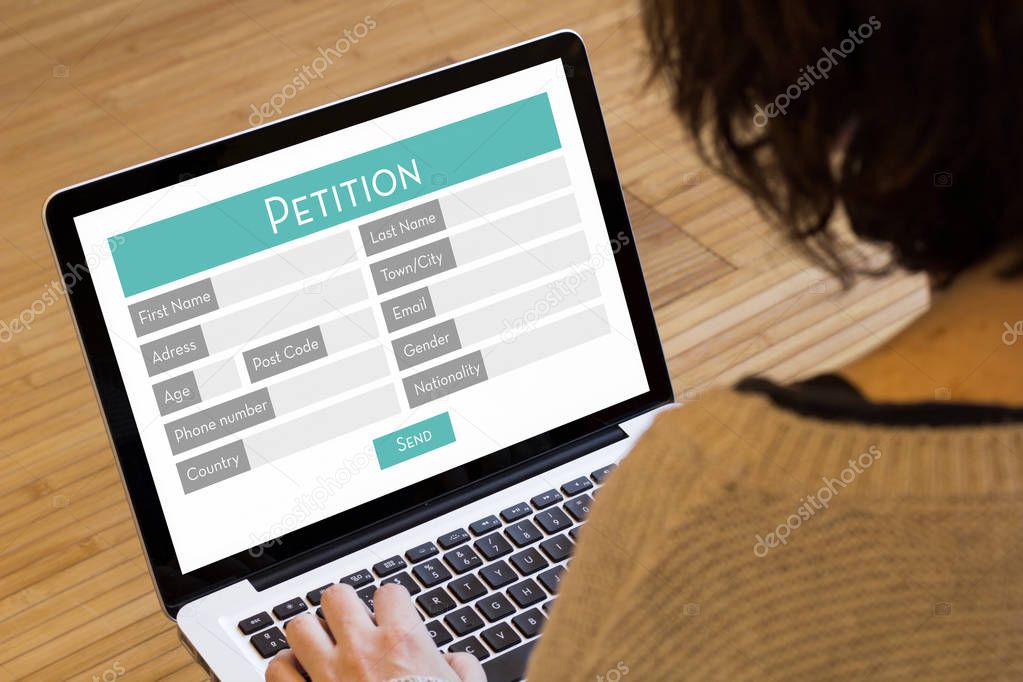 woman computer petition online