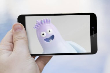 Trol dağ eteğindeki taş yığını üzerinde gösterilen smartphone