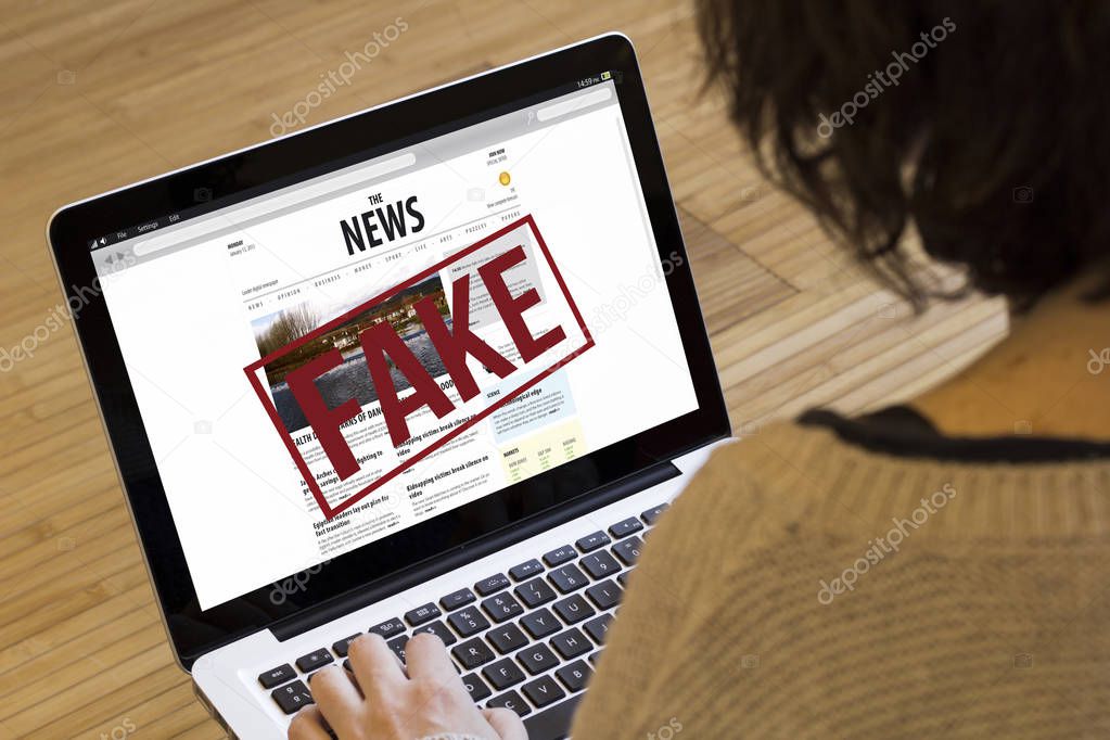 woman reading fake news 