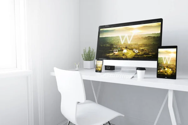 devices on white minimal workspace