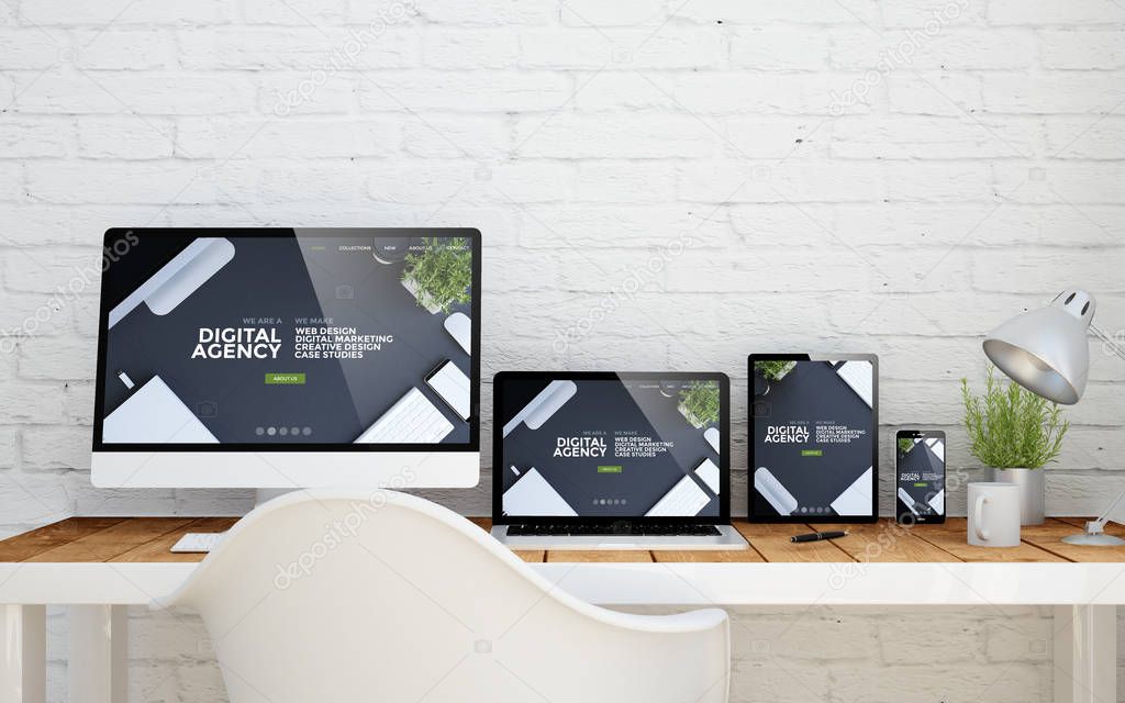 devices with agency website design on screens   