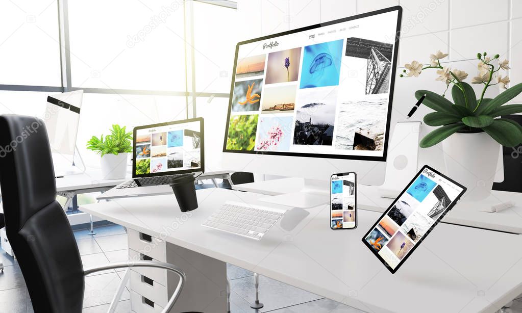 3d rendering mockup of computers, mobile devices and assorted office supplies floating  in mid-air at office showing portfolio