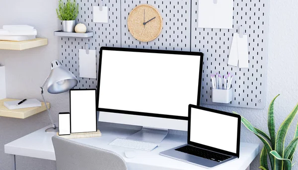 Modern and minimalist desk with different devices and an moadboard with paper clips mock up. 3d rendering